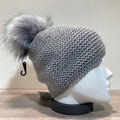 Bonnet uni gris doublé avec pompon