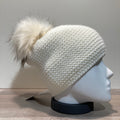 Bonnet uni écru doublé avec pompon