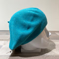 Béret turquoise