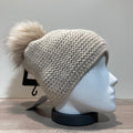 Bonnet uni beige doublé avec pompon