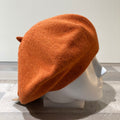 Béret orange foncé