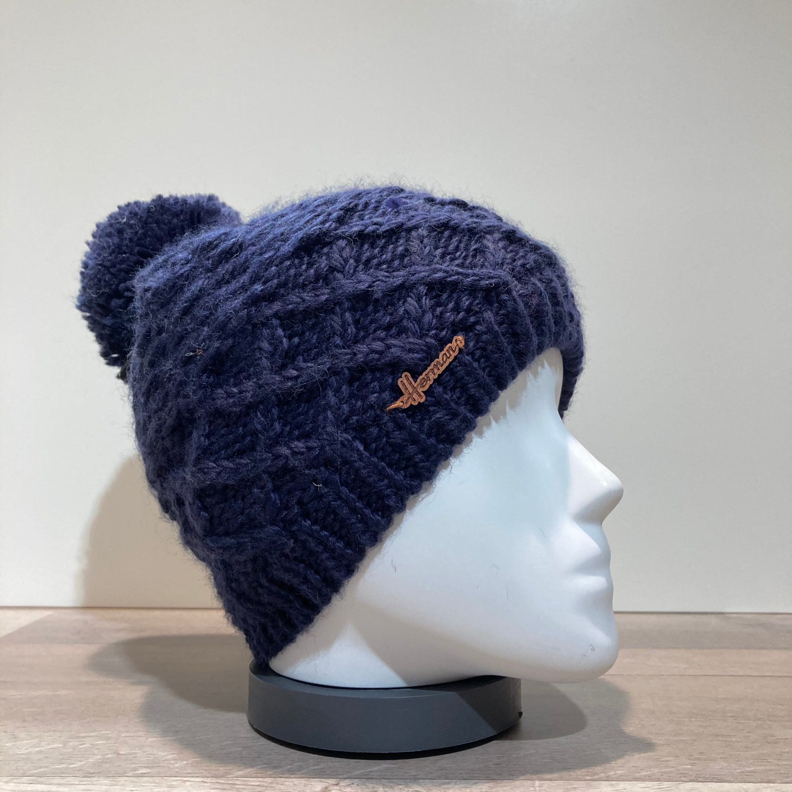 Bonnet tricot uni marine doublé avec pompon Herman