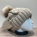 Bonnet tricot torsadé uni beige doublé avec pompon