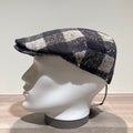 Casquette laine vierge noir-écru doublée